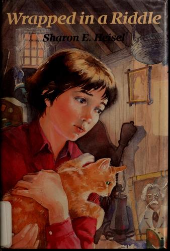 Wrapped in a riddle by Sharon E. Heisel